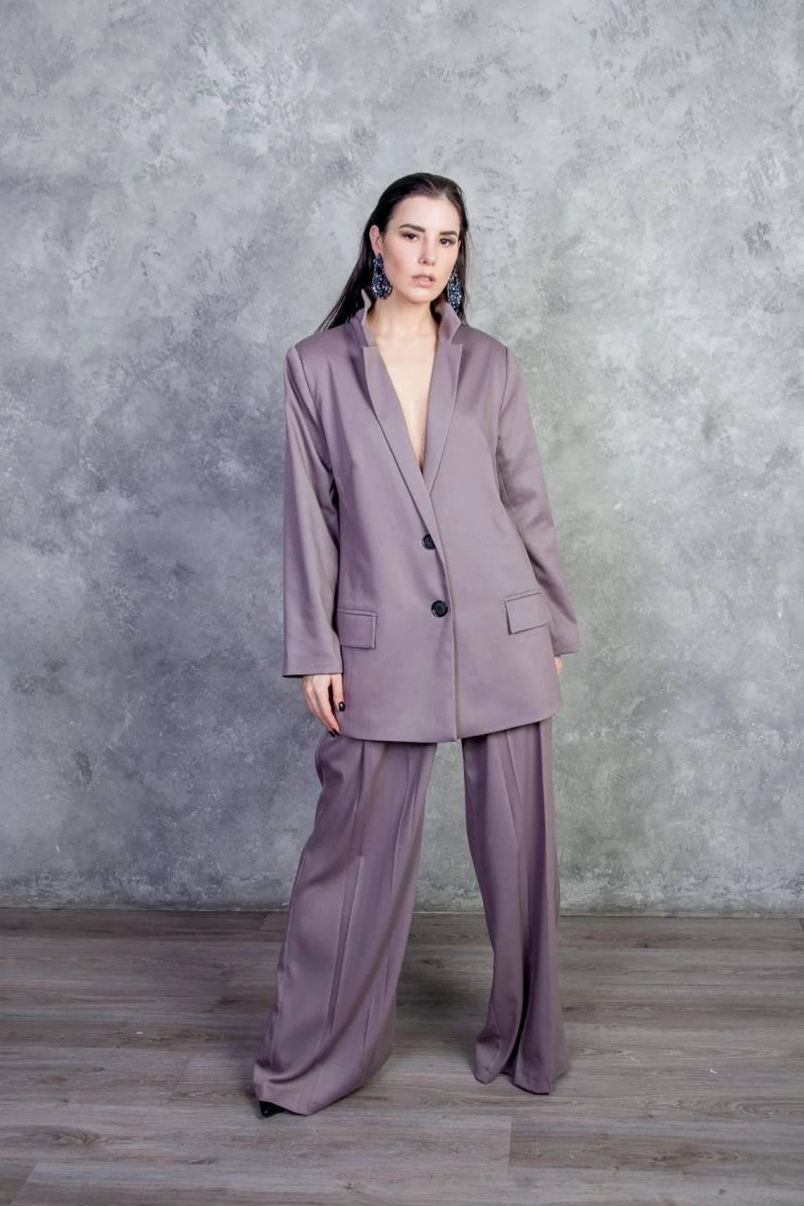 Suit. Women trouser suit. Trousers with pleats on the front and back, a loose fitting jacket, oversized, Long jacke